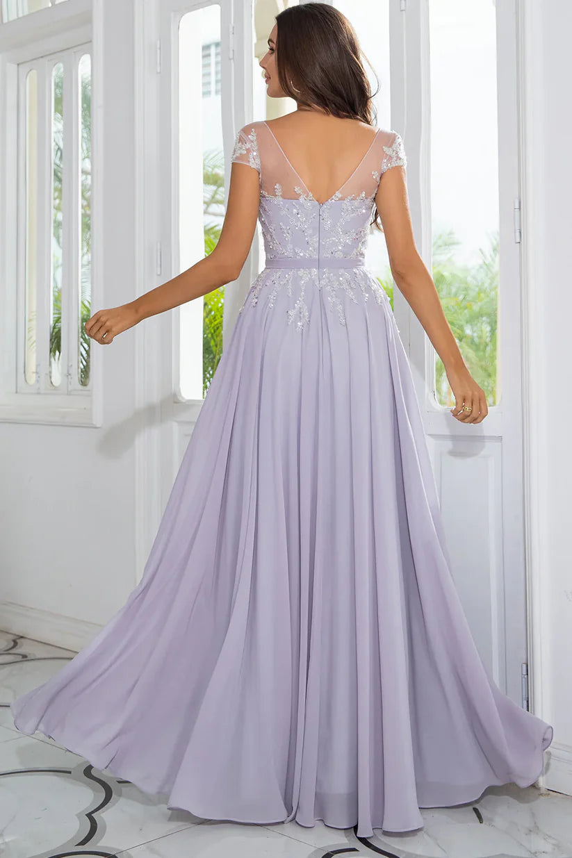 Full length view of the grey beaded chiffon formal dress.