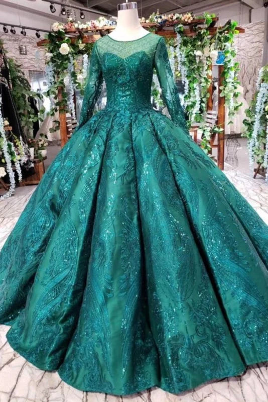 Elegant long sleeve beaded ball gown prom dress.
