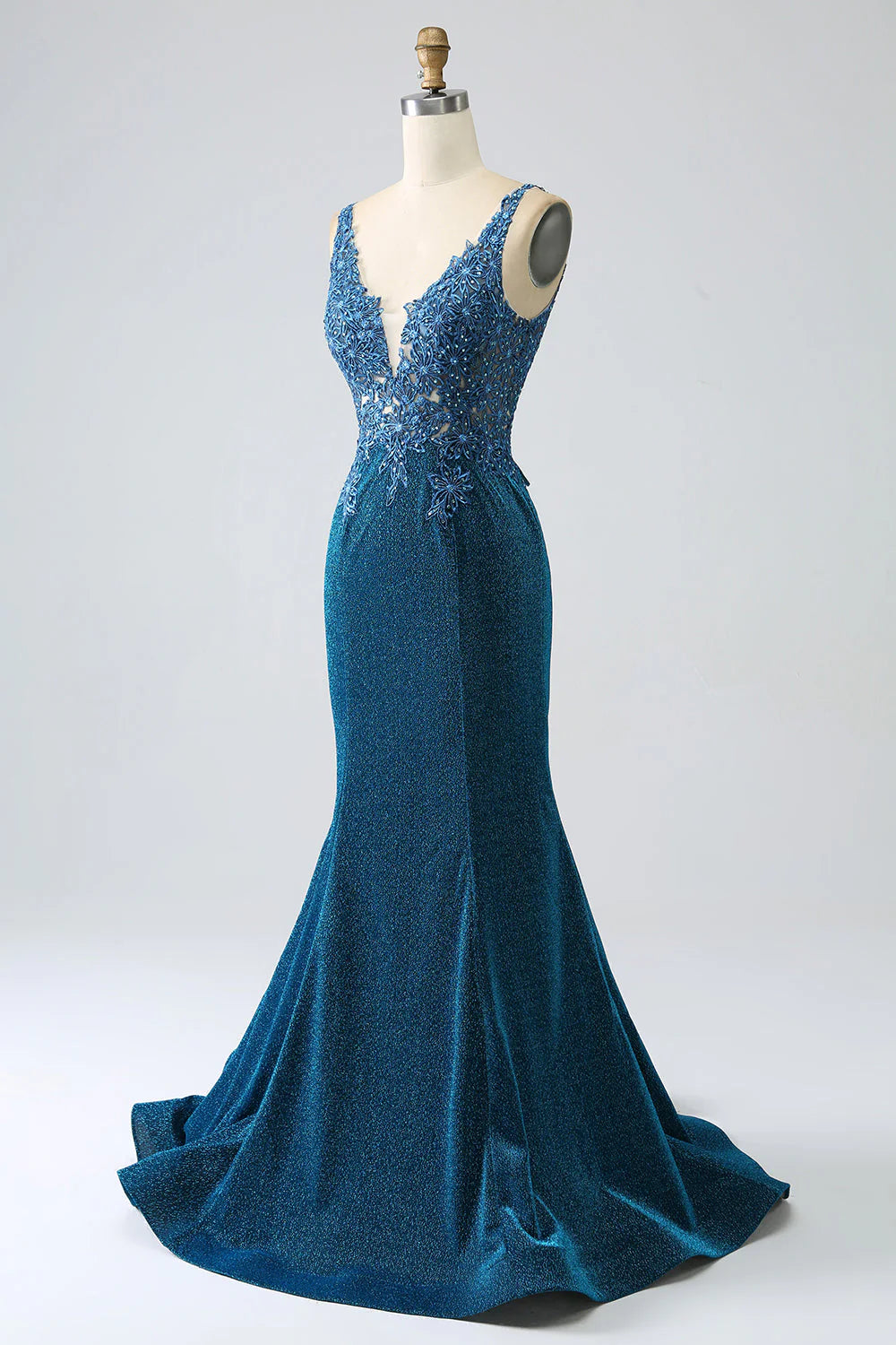 Back view of the elegant dark blue mermaid prom gown.