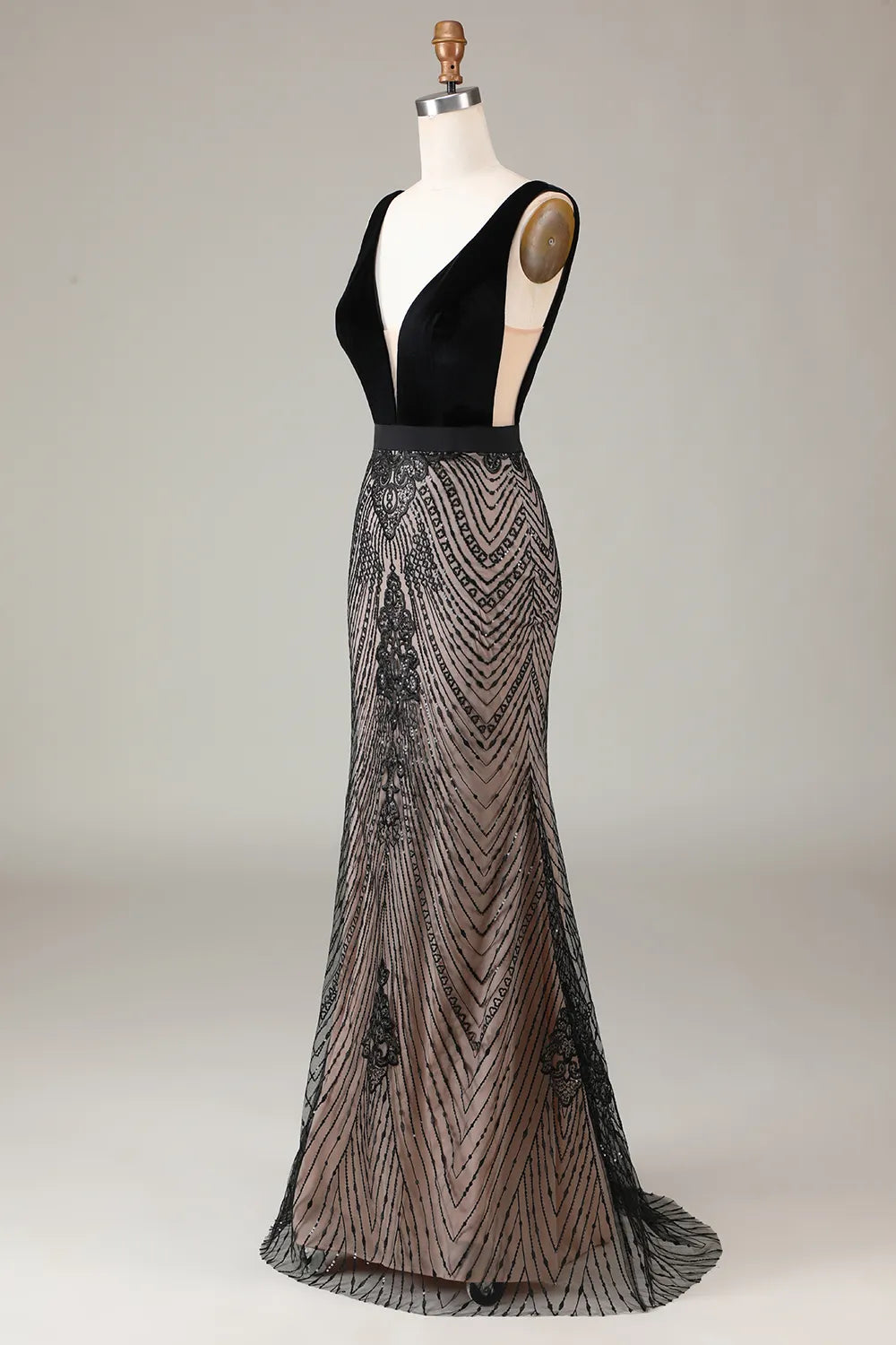 Side view of the long mermaid prom dress, highlighting the silhouette.