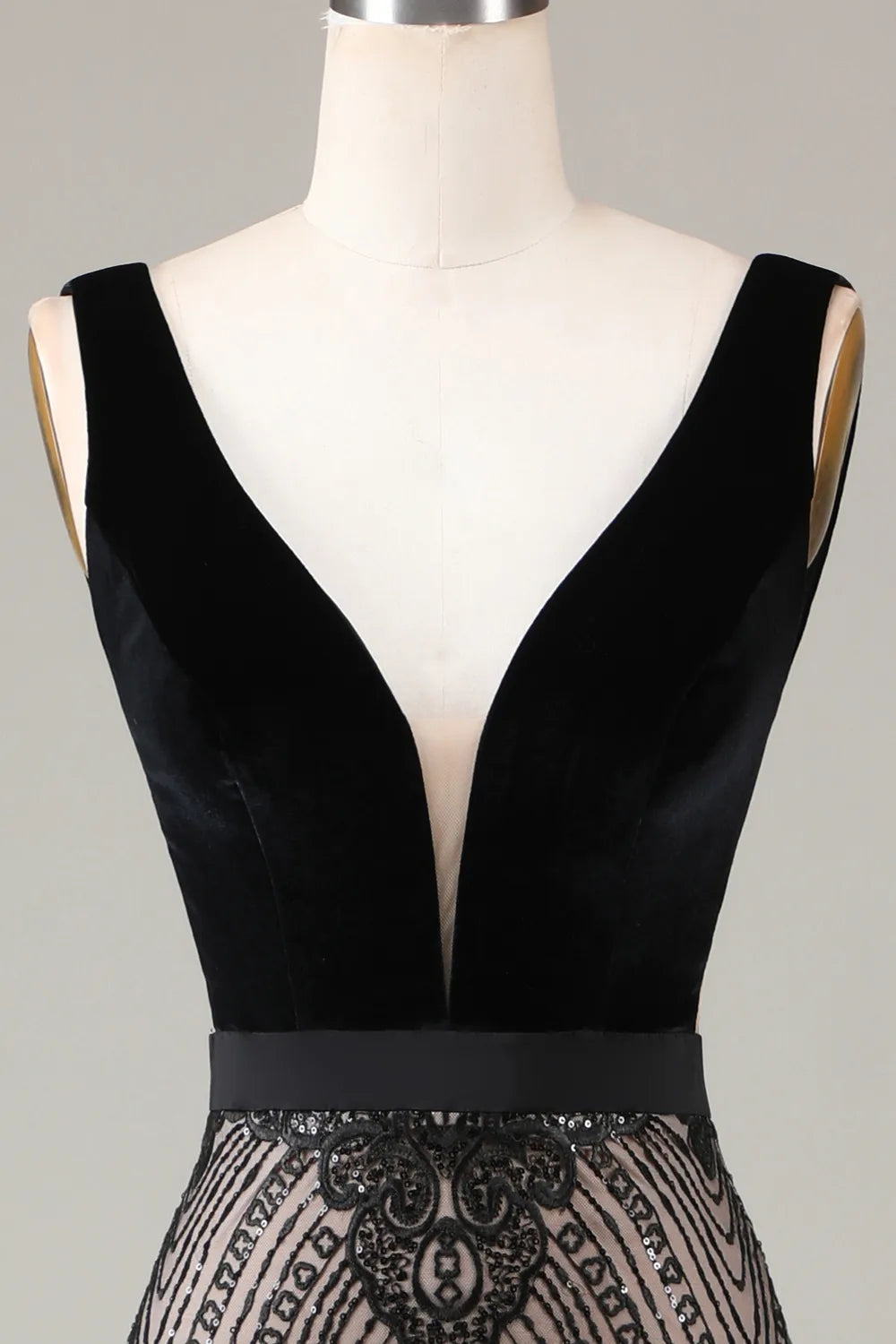 Back view of the beaded mermaid gown, showcasing its elegant train.