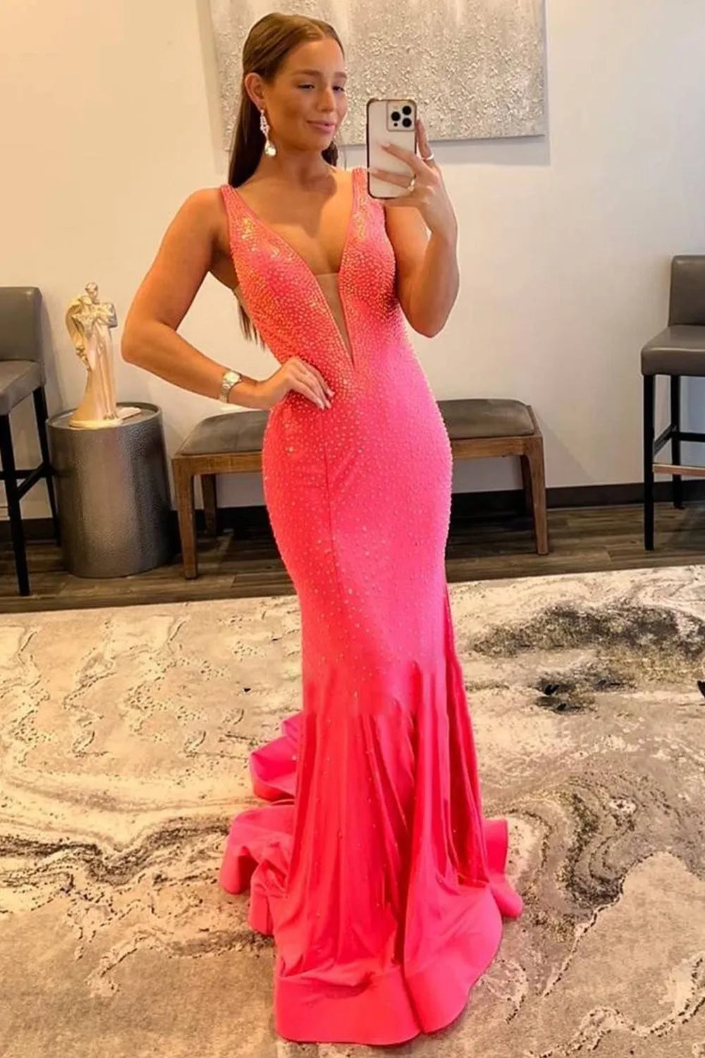 Model showcasing the flowing train of the mermaid dress.