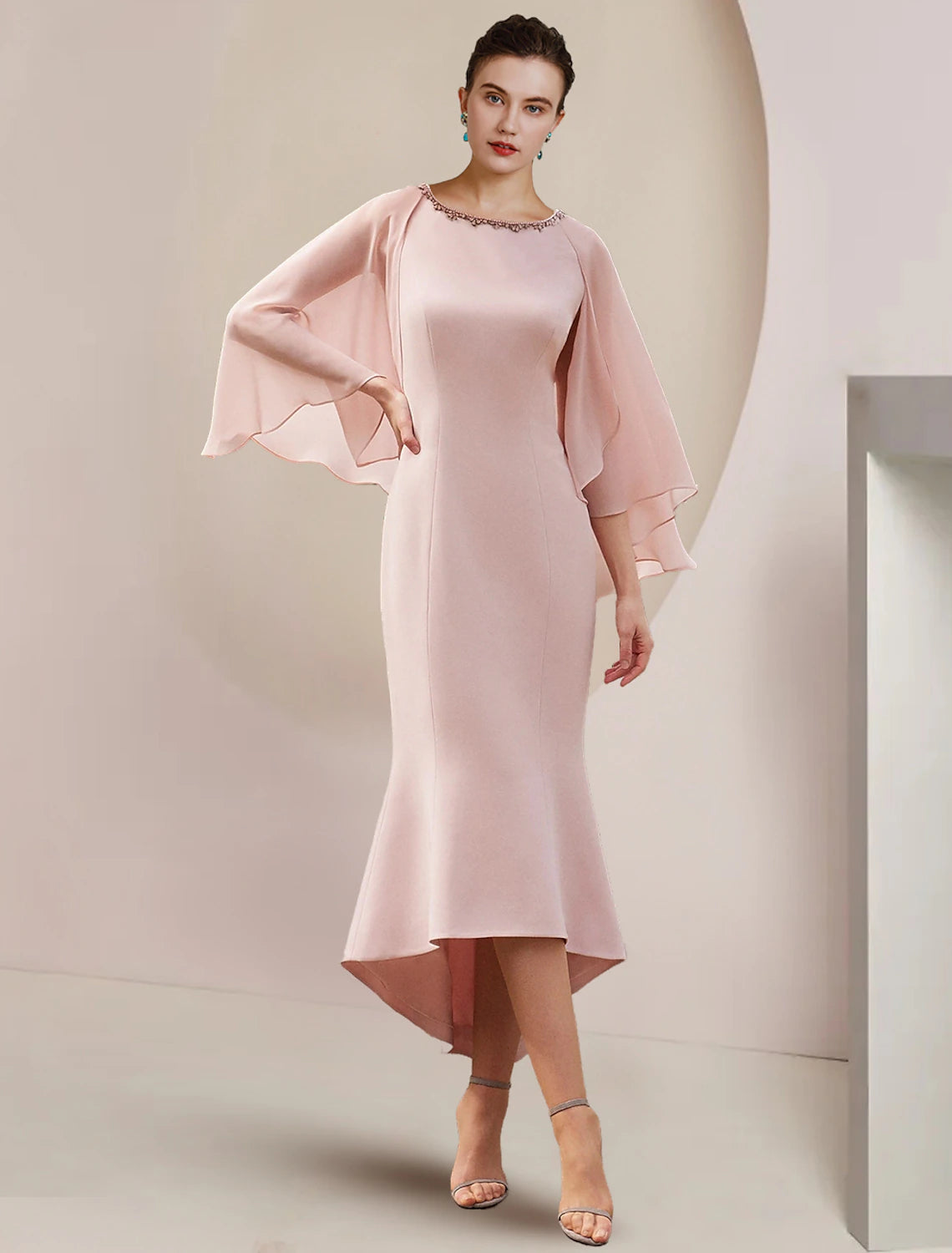 Elegant beaded mermaid trumpet dress for formal occasions.