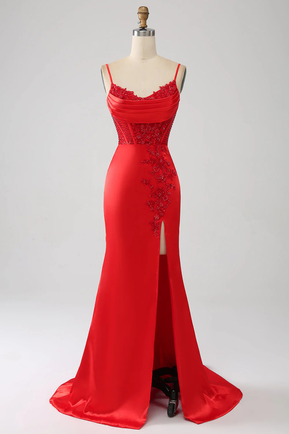 Red mermaid beaded prom dress with a high slit.