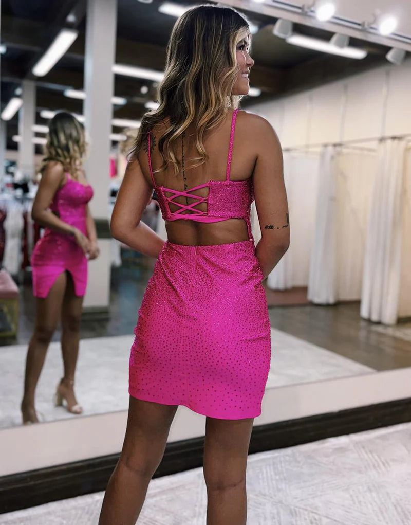 Sparkling short satin homecoming dress with intricate beading.