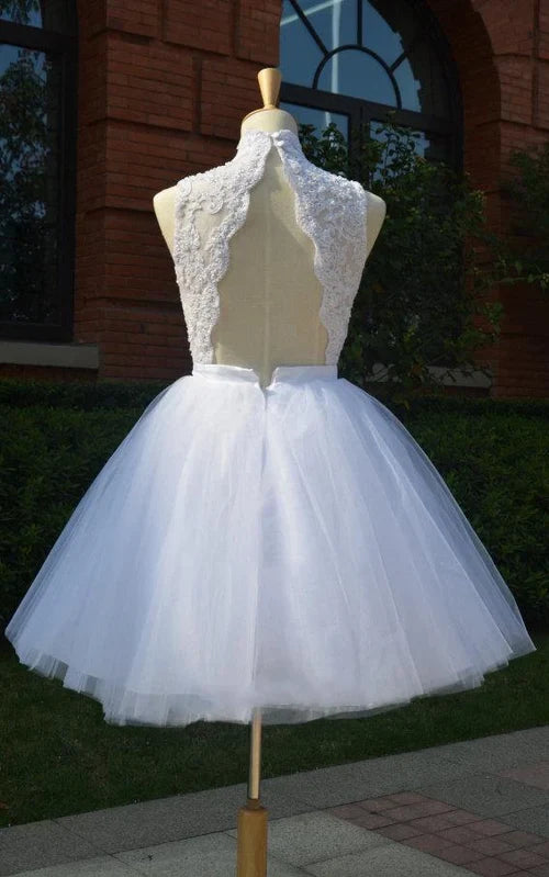 Close-up of intricate beading and lace on the keyhole back of the dress.