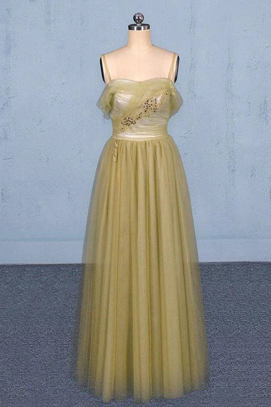 Elegant spaghetti strap floor-length tulle prom gown with intricate beading.
