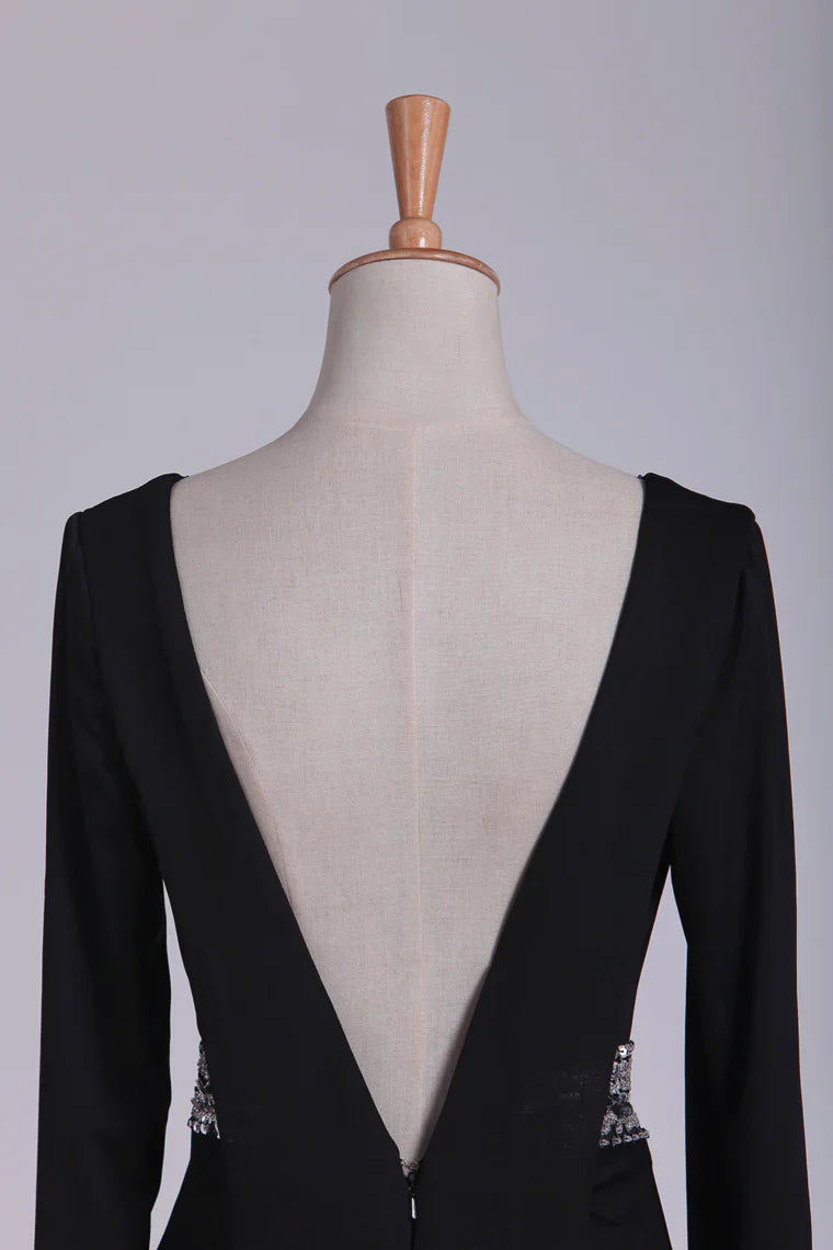 Side profile of the long sleeve V-neck Mother of the Bride gown.