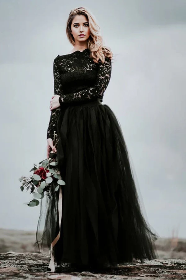 Back view of the black V-neck wedding dress with flowing A-line skirt.