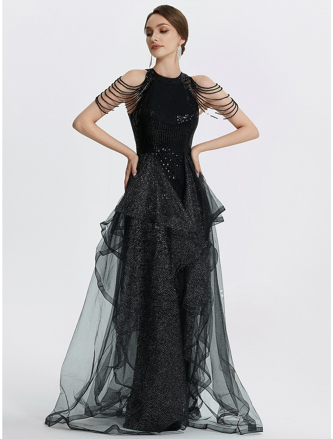 Full length view of black short sleeve jewel neck prom dress.