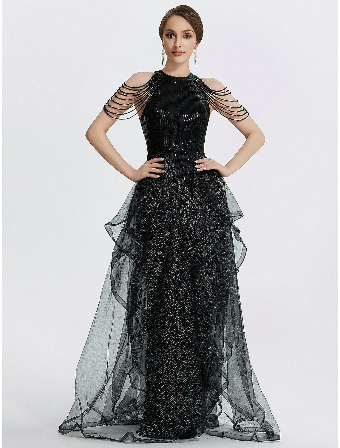 Elegant black mermaid trumpet dress with intricate beading.