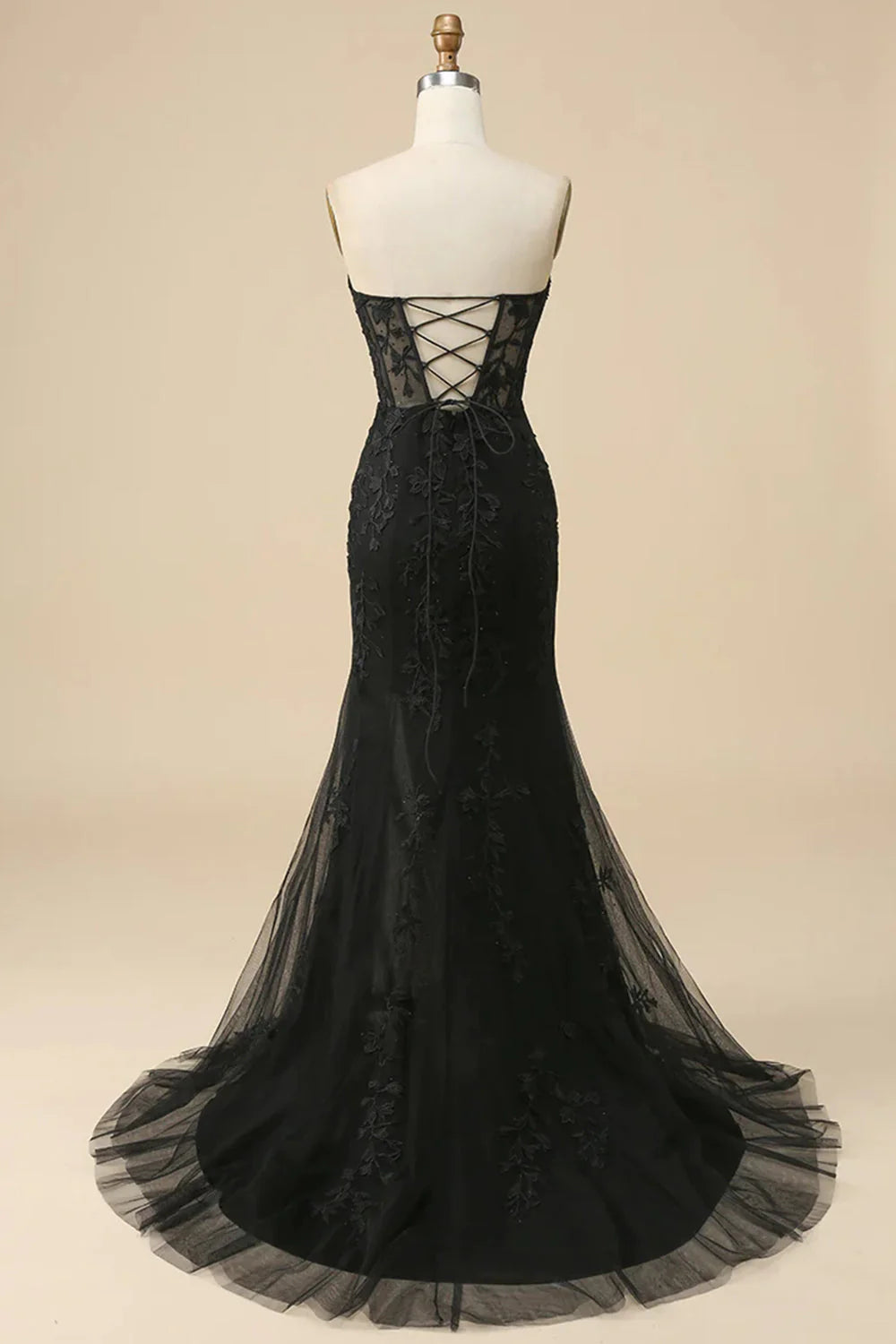 Back view of the black mermaid prom dress, showcasing lace details.