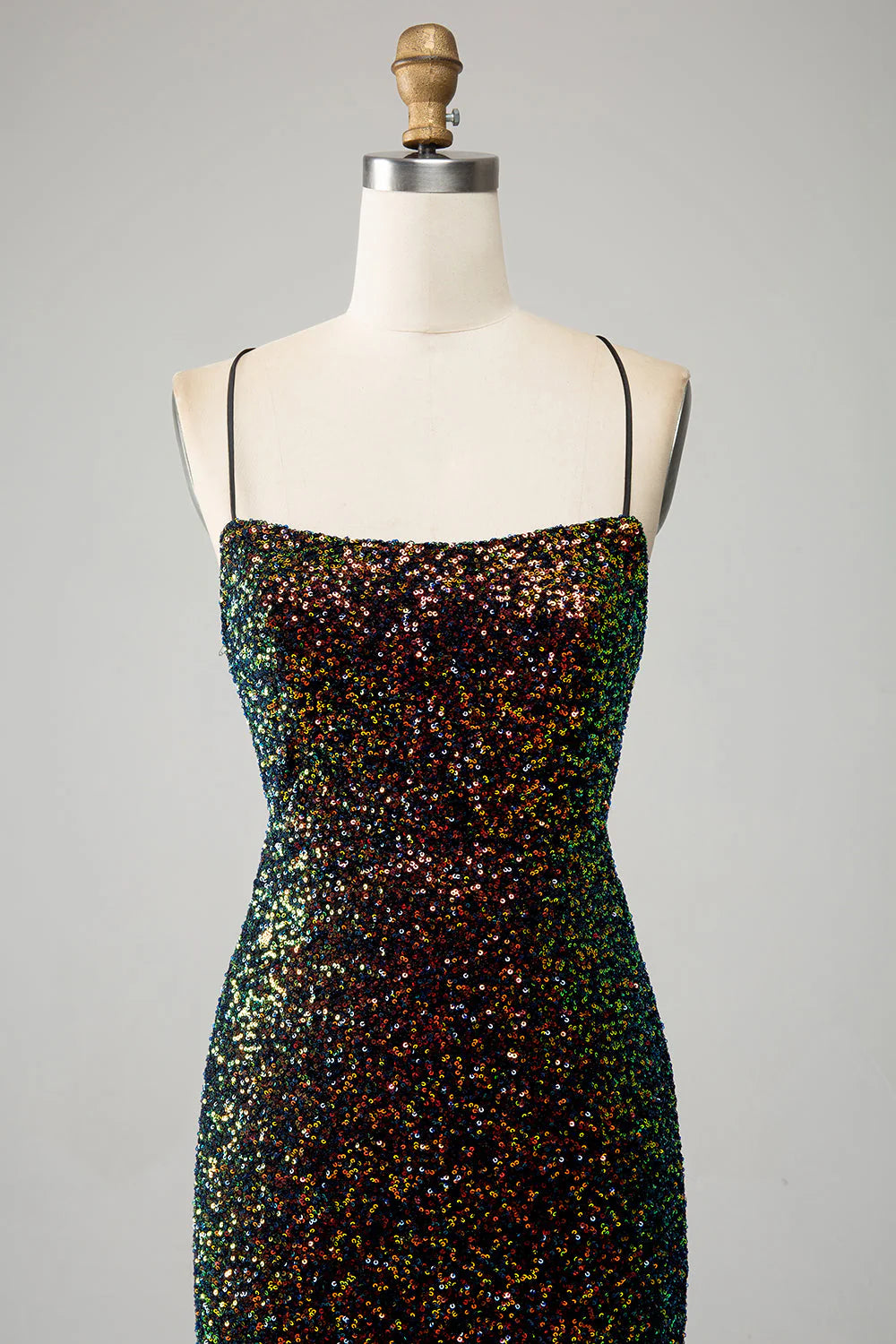 Close-up of the sequin detailing on the black mermaid prom dress.