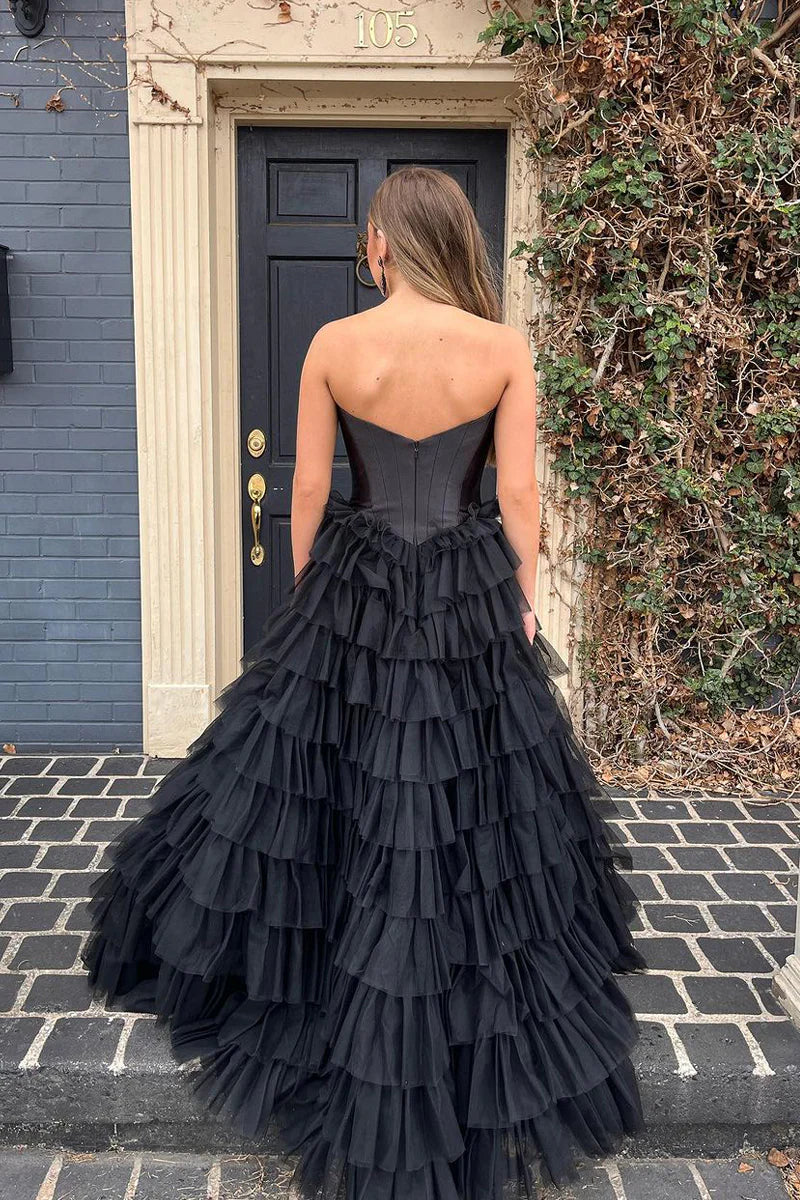 A close-up of the black sweetheart tulle ball gown prom dress, highlighting the fabric and neckline details.