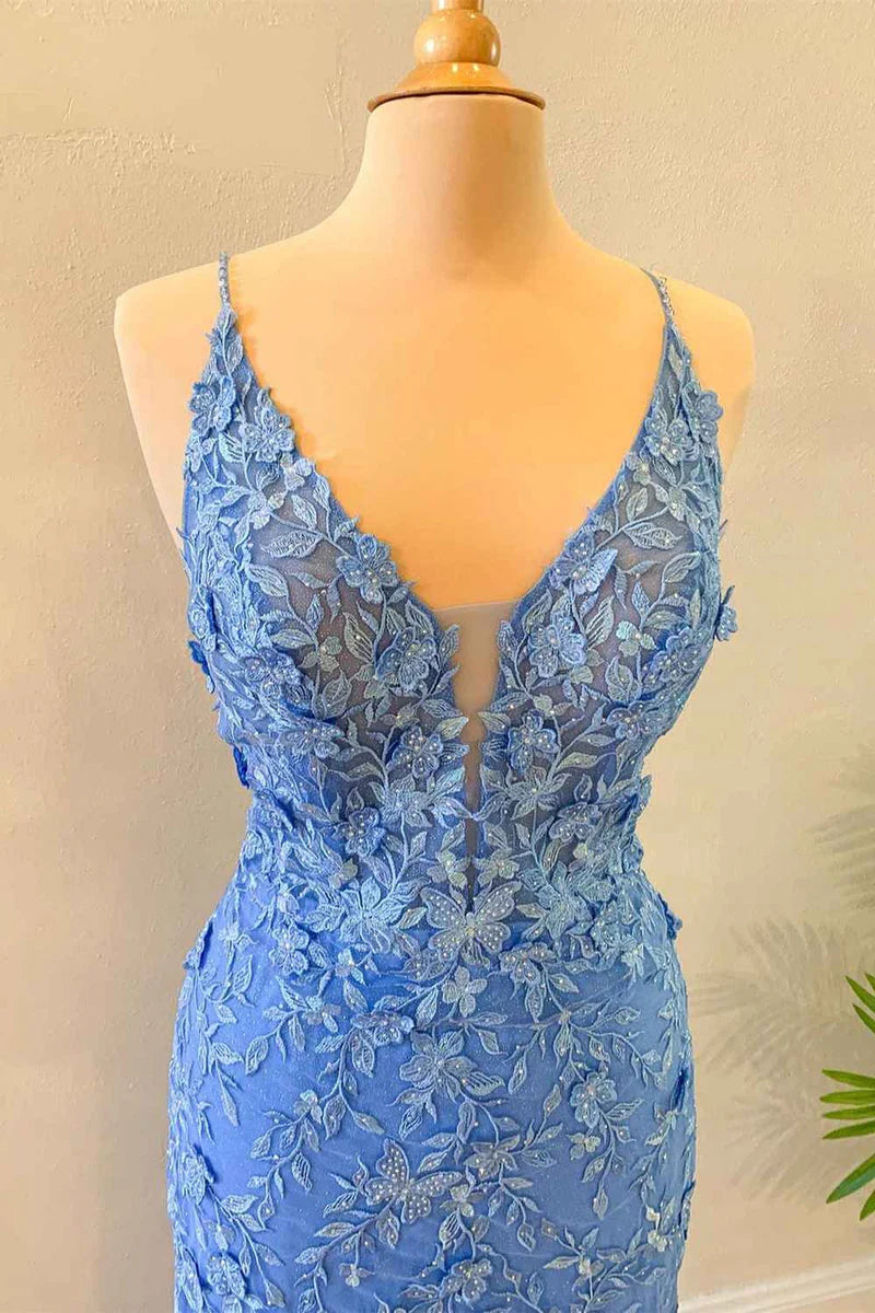 Back view of a long blue floral lace mermaid dress.