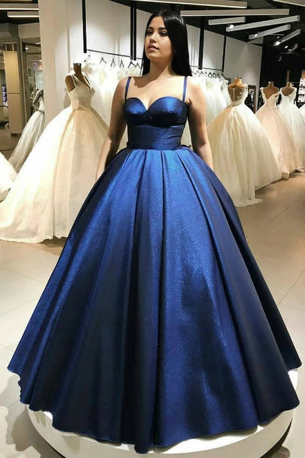 Blue ball gown prom dress with sweetheart neckline and spaghetti straps.