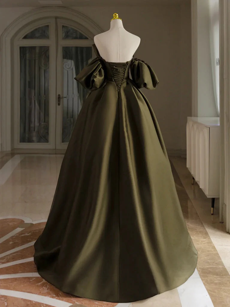 Side view of a woman wearing the elegant blush satin prom dress.