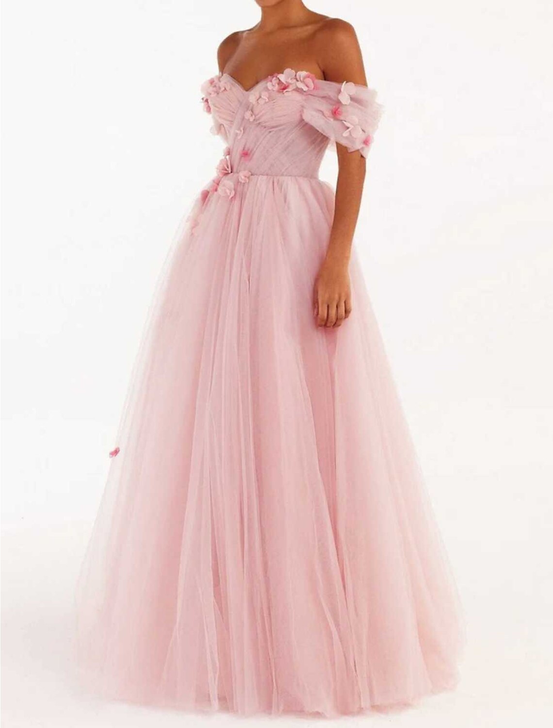 Side view of elegant blush tulle ball gown with floral details.