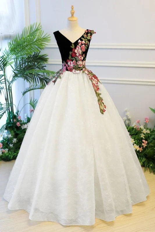 Full view of an elegant blush V-neck lace applique ball gown Quinceanera dress.