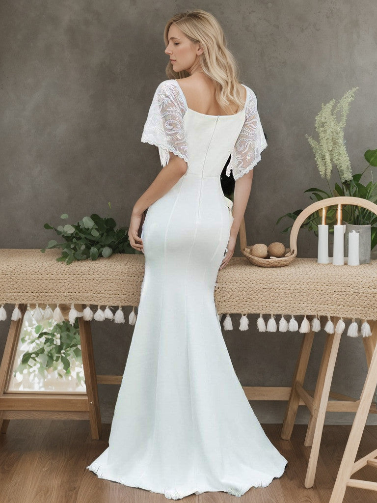 Cream V-neck maxi bodycon dress, side view.