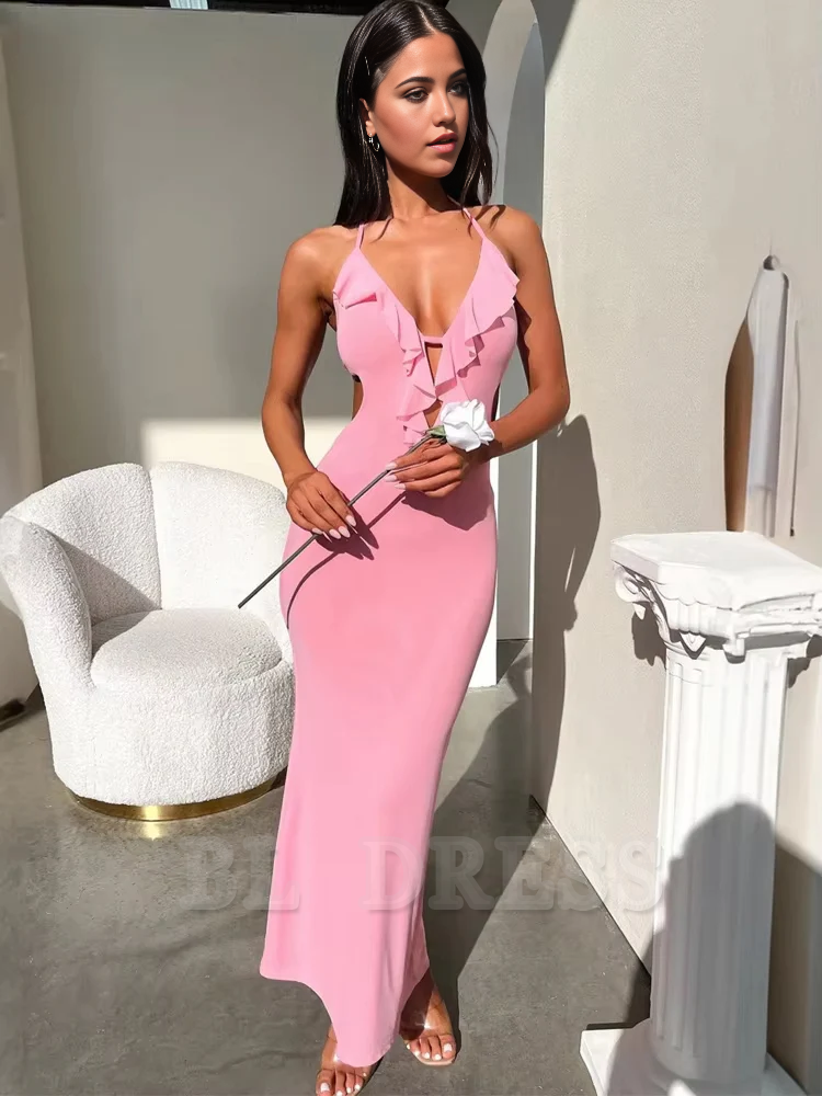 Back view of woman in sleeveless backless bodycon dress.