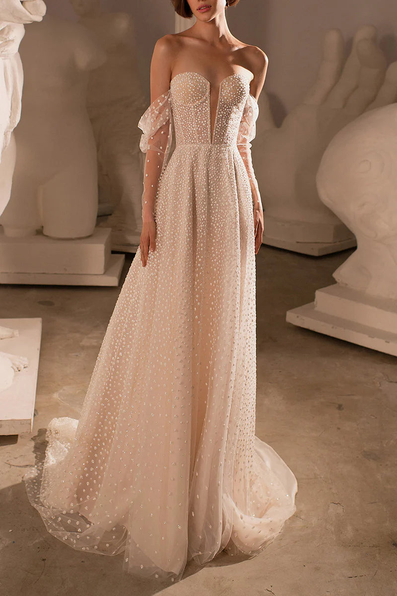 Elegant Boho A-line deep V-neck wedding dress.