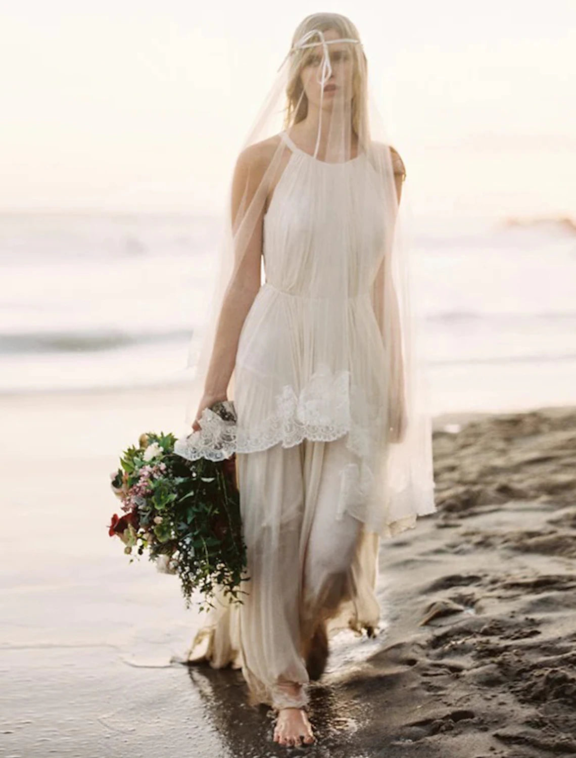 Back view of a Boho A-Line halter wedding dress featuring an open back design.