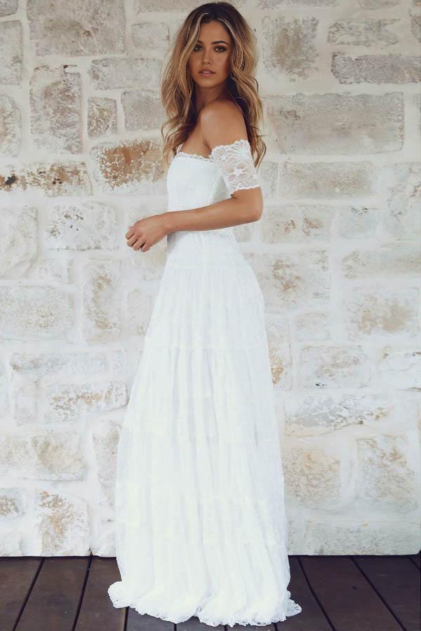 Close-up of the lace detail on a short sleeve wedding dress.