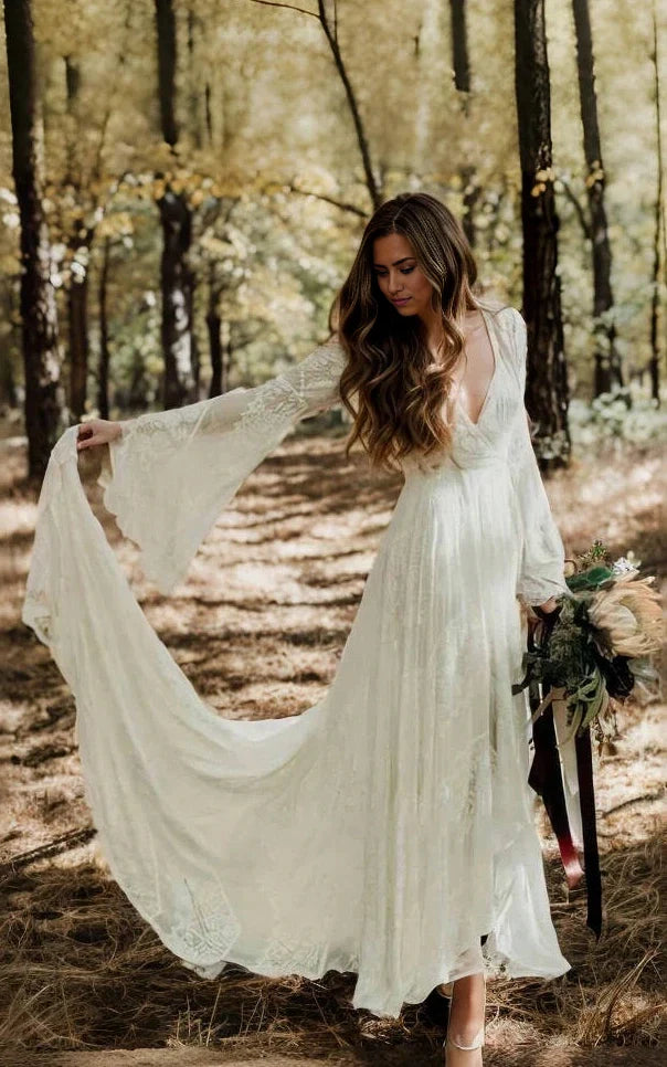 Boho lace wedding dress showing V-neck and long sleeves.