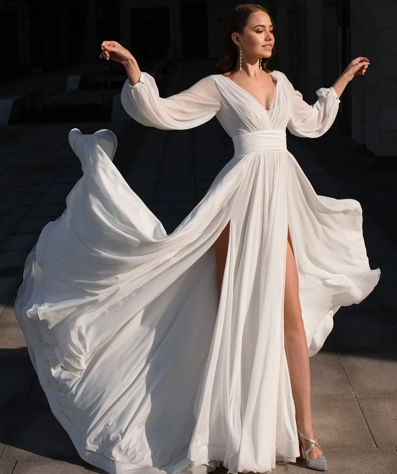 Elegant A-line boho V-neck long sleeve wedding dress.