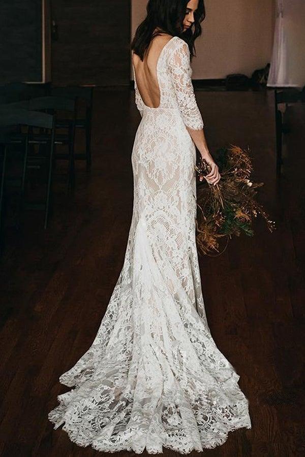 Side profile of a bride in the Boho Mermaid Lace Wedding Dress.