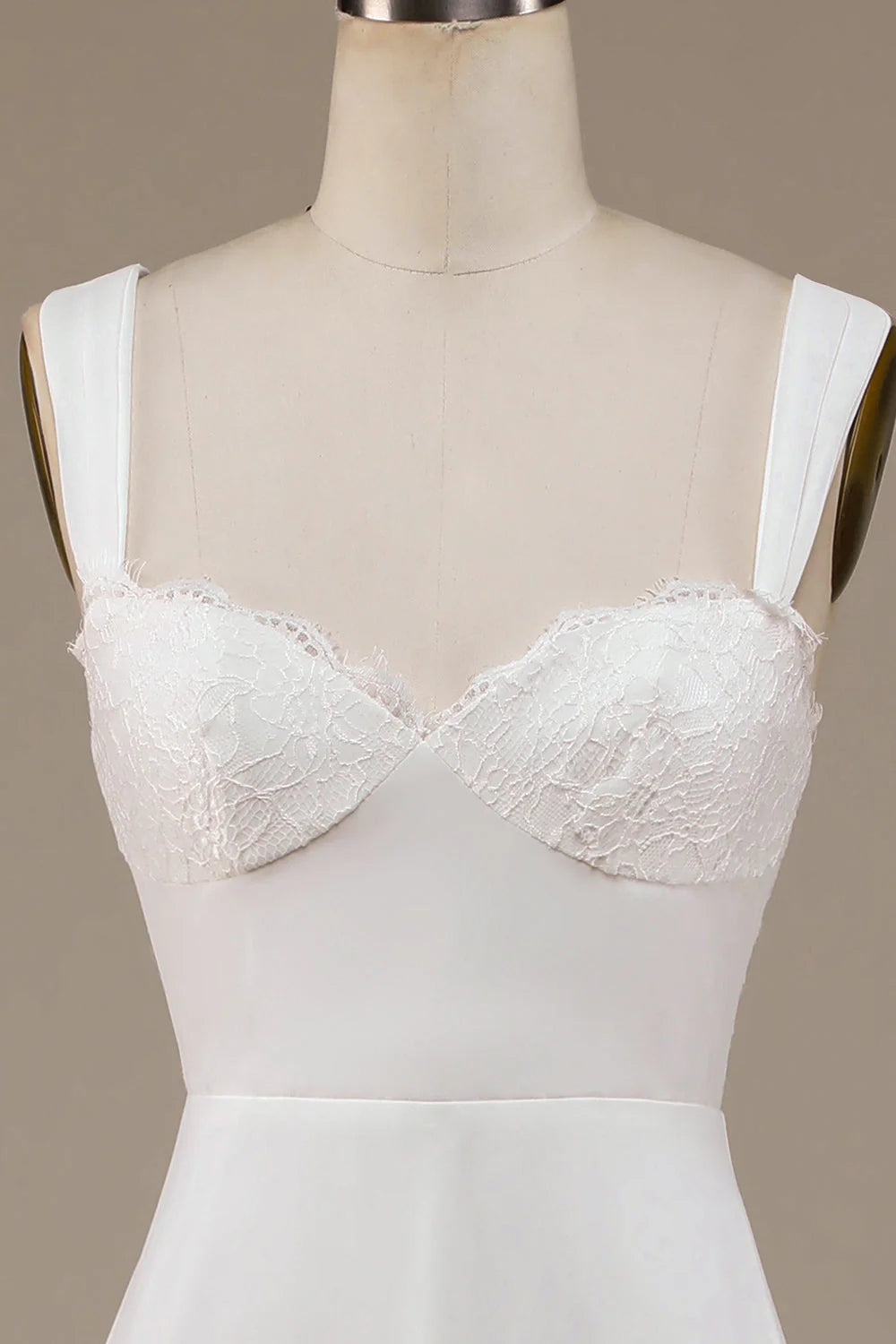 Back view of the ivory lace maxi wedding gown, showcasing its elegant train.