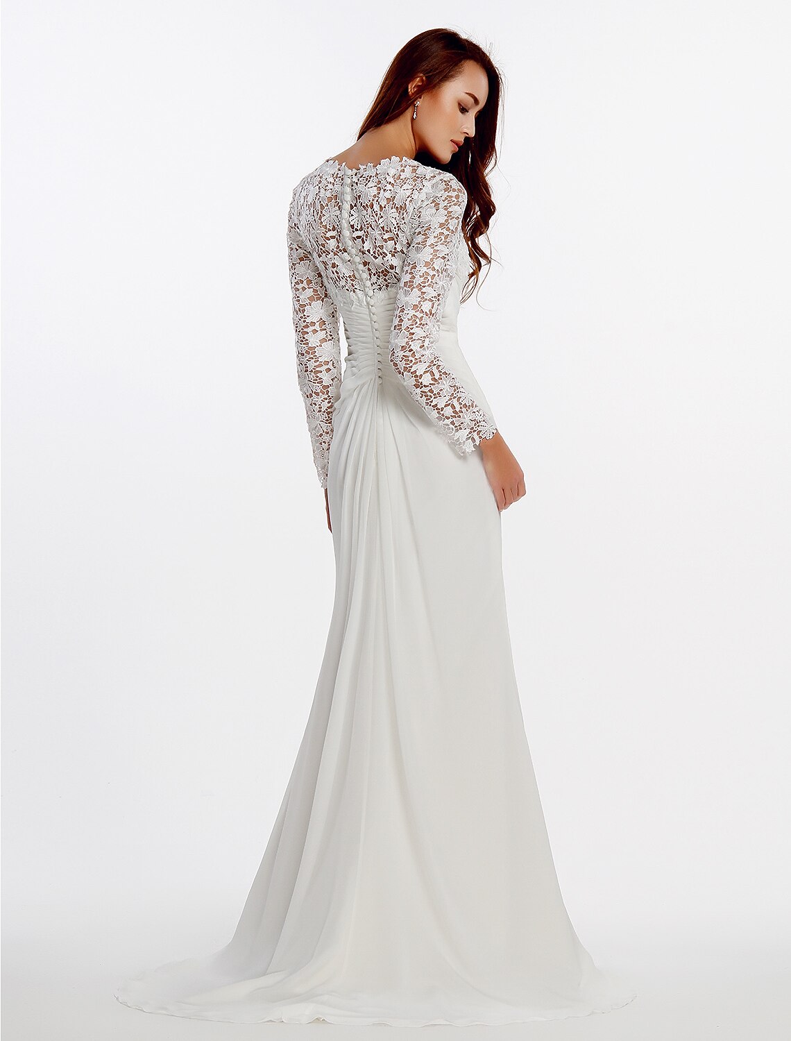 Back view of a white chiffon wedding dress showing sweep train and button details.