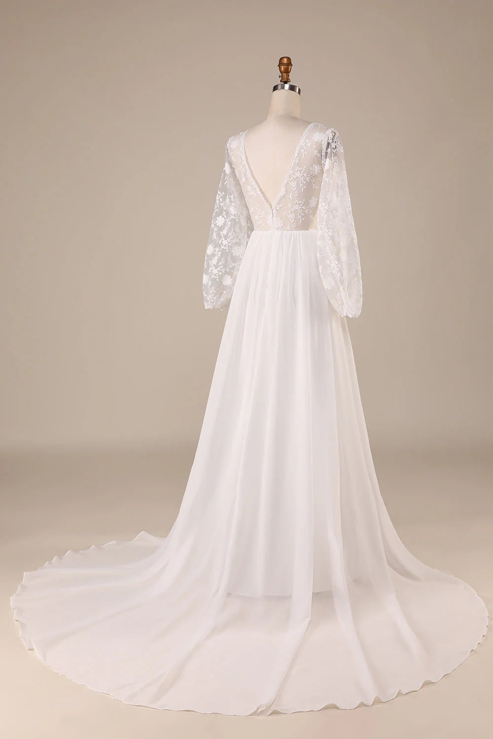 Back view of Boho Ivory Wedding Dress showing sweep train and lace details.