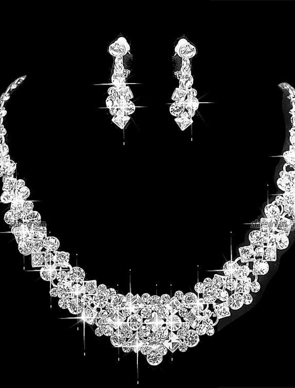 Elegant clear alloy bridal jewelry set featuring a necklace and matching earrings with a geometrical round design.