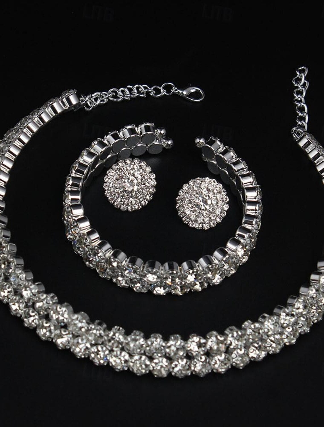 Close-up of the imitation diamond necklace and earrings from the bridal set.