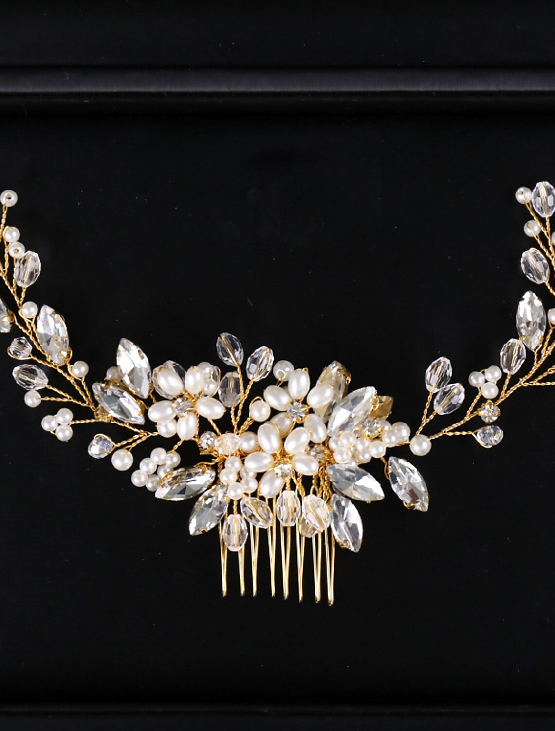 Bridal hair comb styled in an elegant updo, demonstrating its placement.