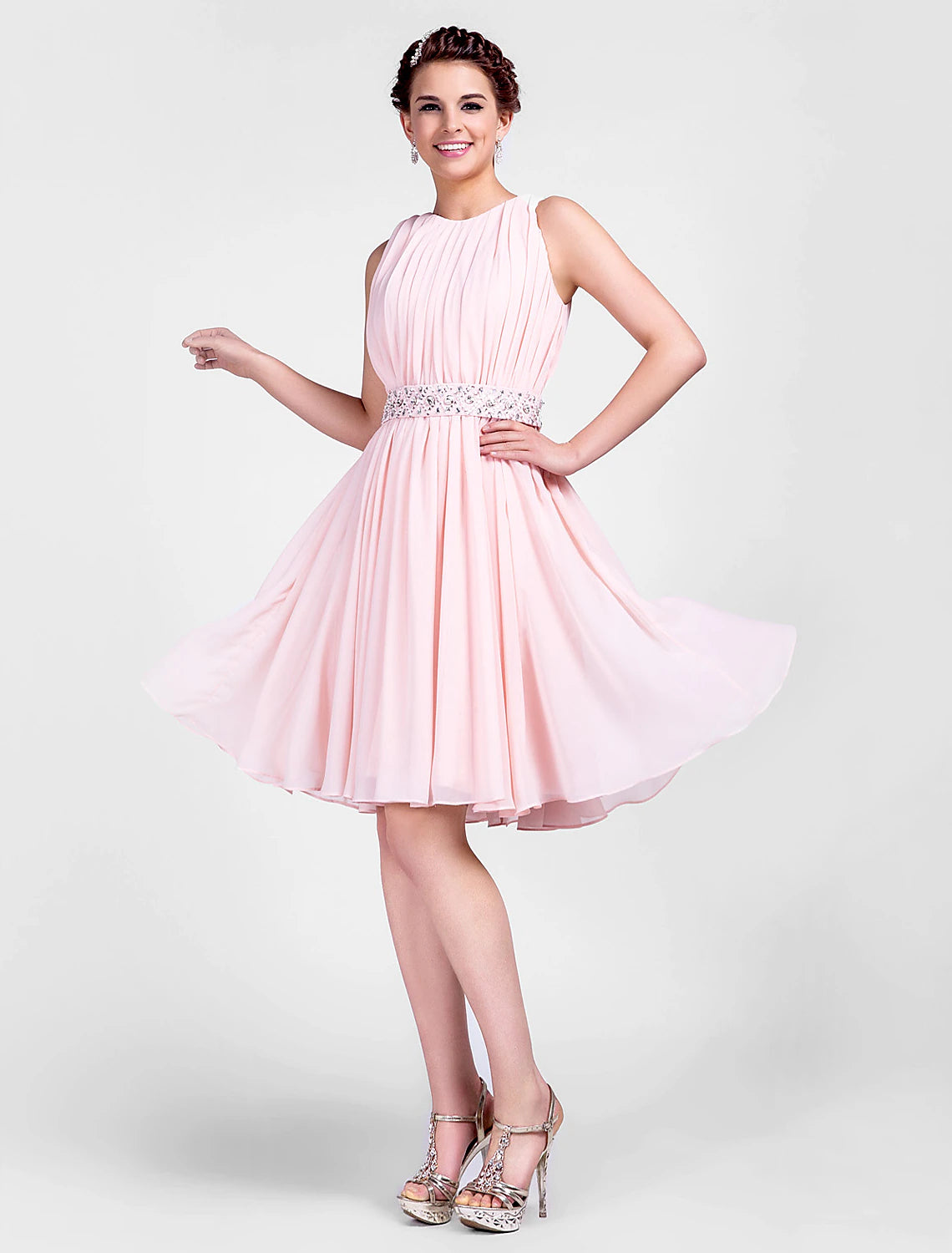 Side view of a jewel neck ball gown with delicate beading.