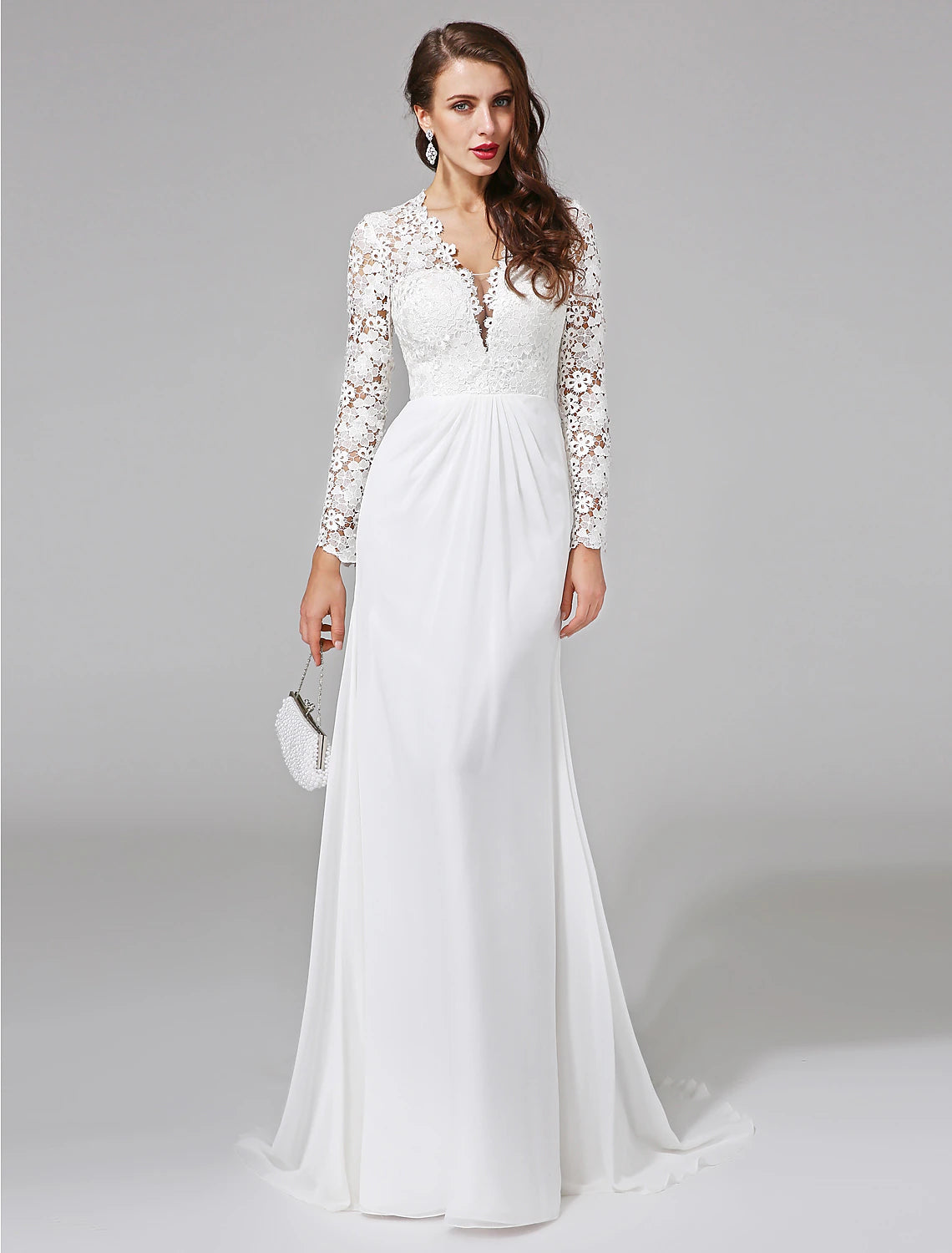 Elegant chiffon boho sheath wedding dress with illusion neck and long sleeves.