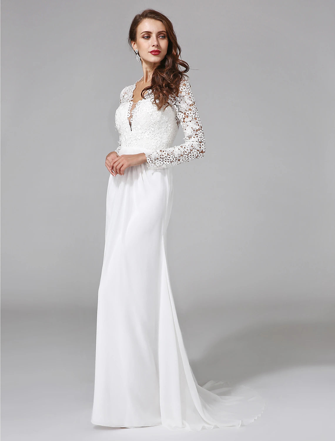 Close-up of the lace button details on the back of a bridal dress.
