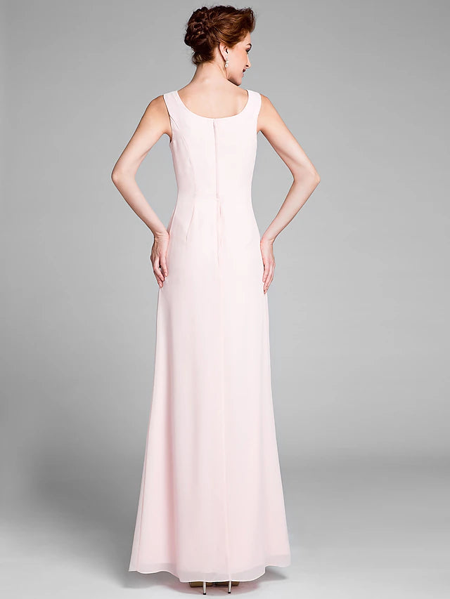 Close-up of scoop neck and long sleeve detail on chiffon dress.