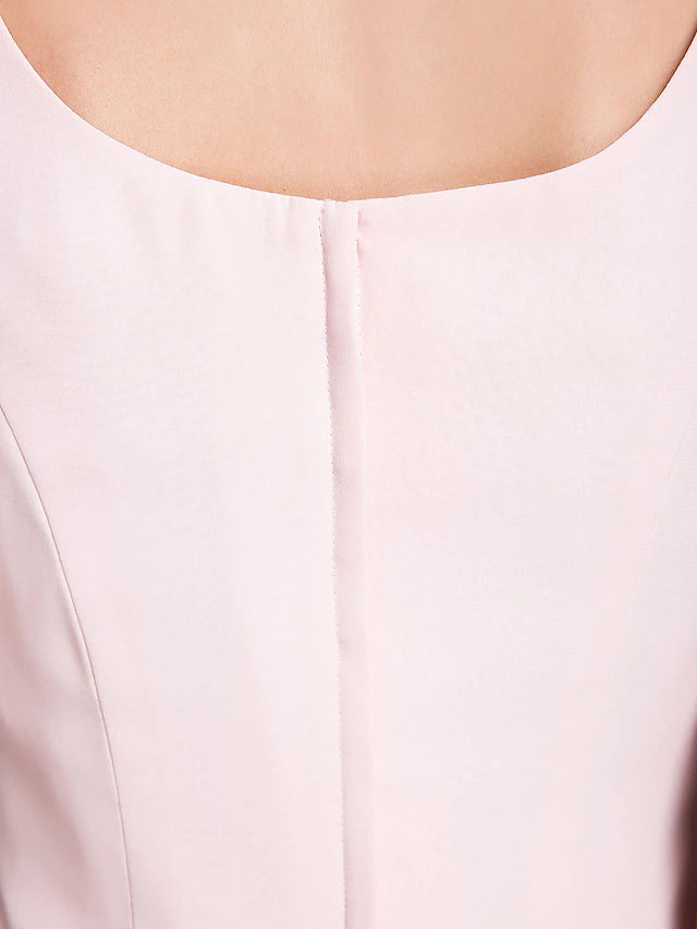 Convertible dress showing versatile styling options with wrap.