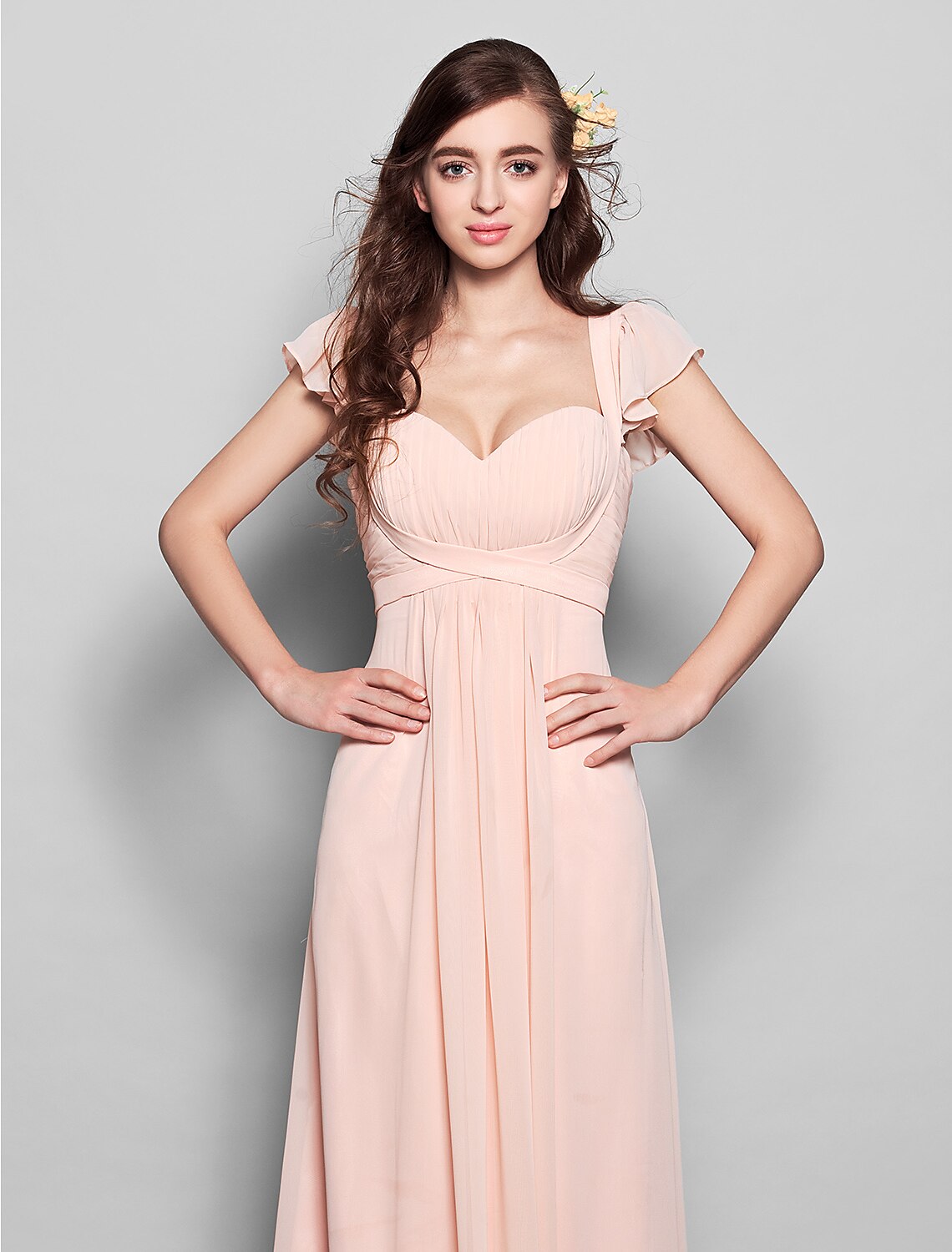 Side view of the elegant sheath dress, highlighting the flowing chiffon fabric.