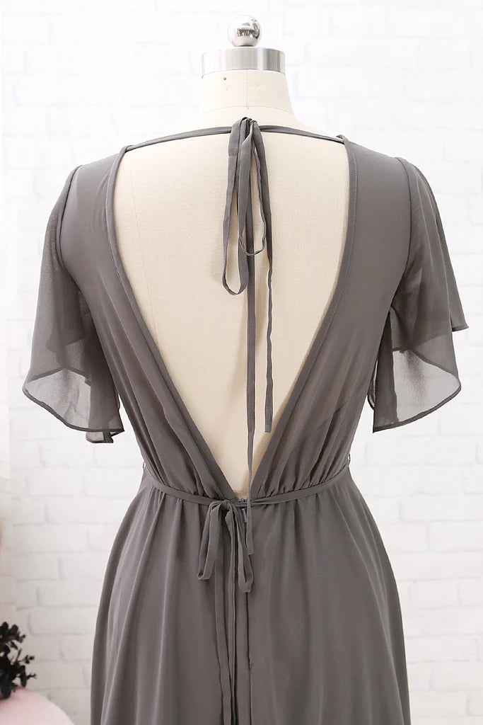 Close-up of the bodice and short sleeves of a chiffon dress.