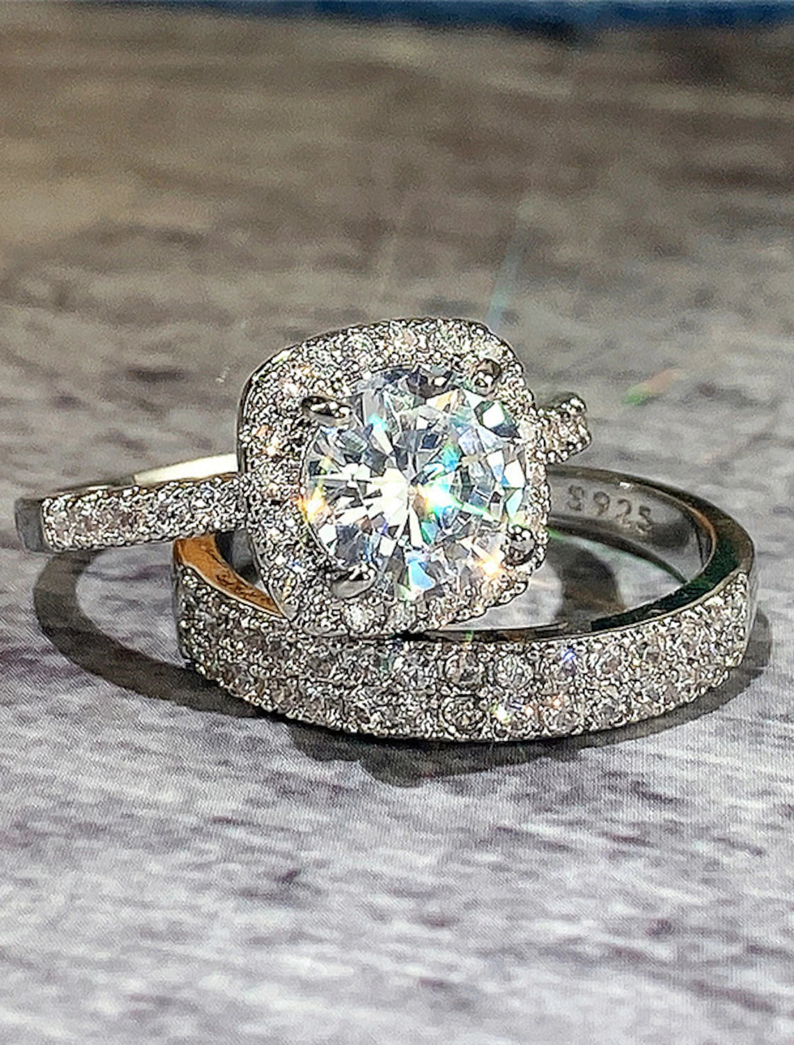Side view of the platinum, gold, and copper wedding rings.