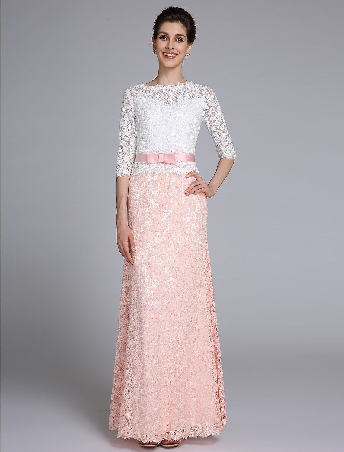 Elegant color block mermaid Mother of the Bride dress with lace half sleeves and jewel neck.