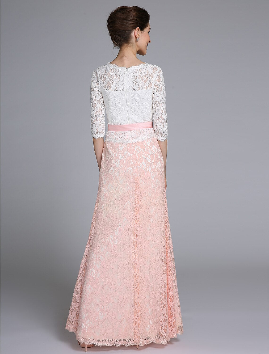 Back view of the color block mermaid gown, showing lace details.