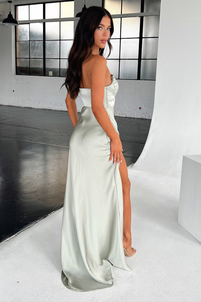 Back view of a silver sage satin strapless maxi dress, showing the fluid column skirt.