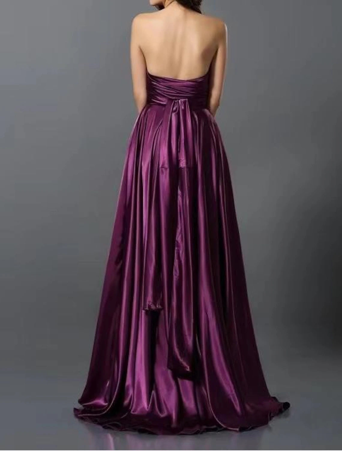 Full view of the A-line convertible dress with a graceful court train and glitter fabric.