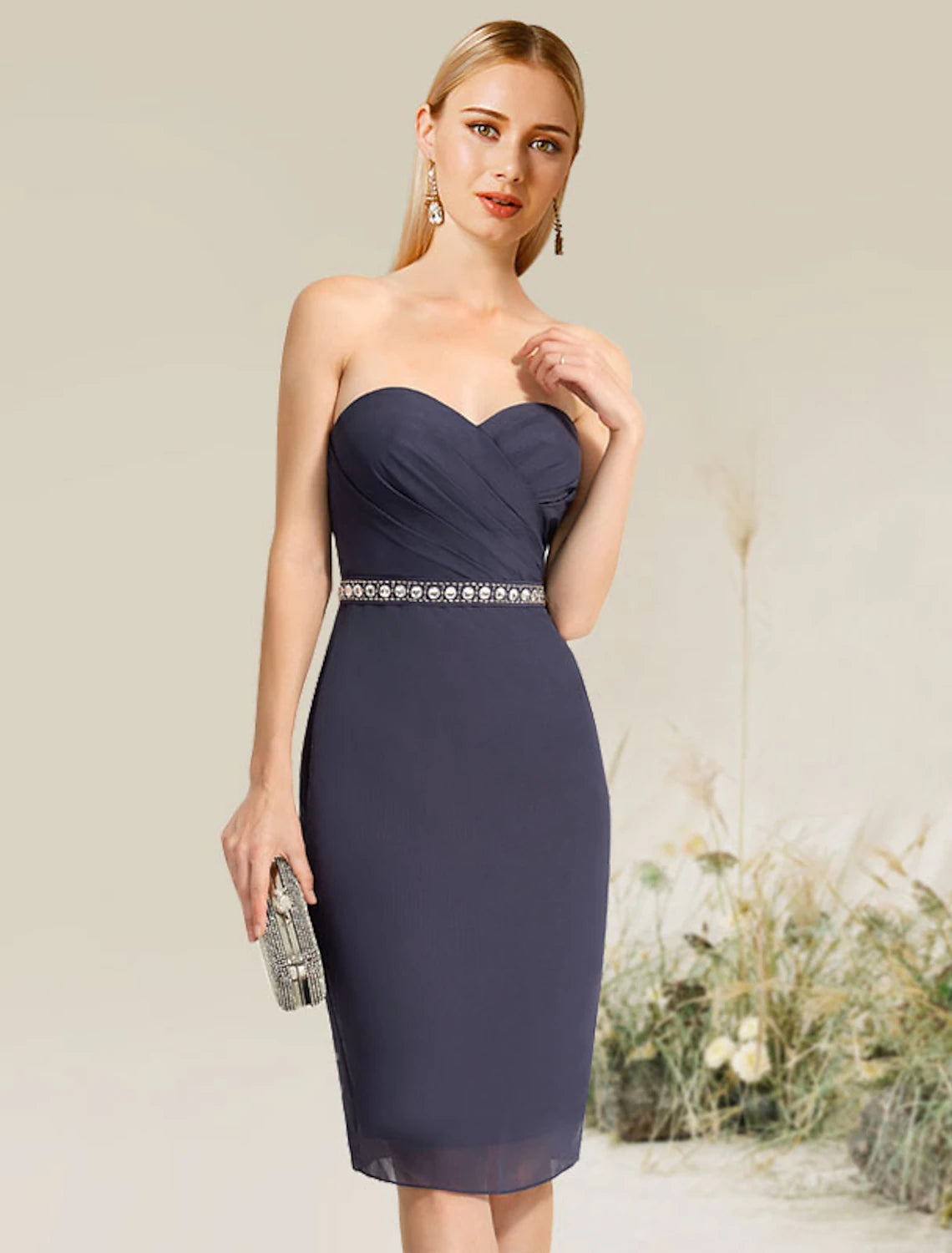 Woman wearing the convertible infinity dress styled with a one-shoulder neckline.